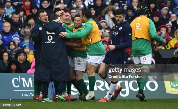 Ireland player Jacob Stockdale celebrates his try with team mates during the Guinness Six Nations match between Scotland and Ireland at Murrayfield...