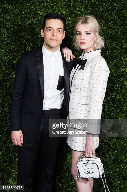 Rami Malek and Lucy Boynton attend the Charles Finch & Chanel pre-BAFTA's dinner at Loulou's on February 09, 2019 in London, England.