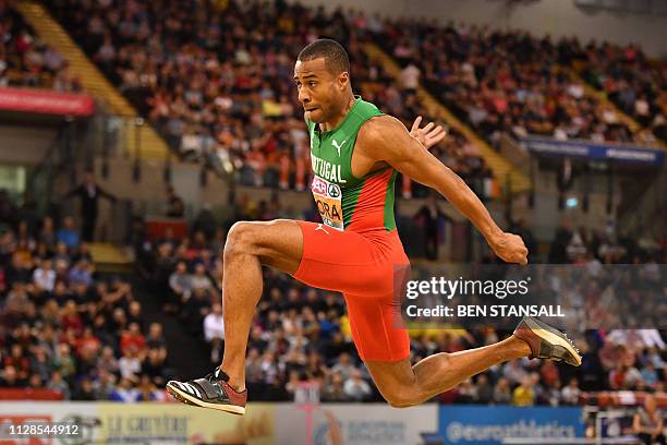 Portugal's Nelson Evora competes in the mens triple jump final at the 2019 European Athletics Indoor Championships in Glasgow on March 3, 2019.