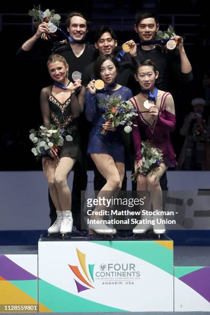 Silver medalists Kirsten Moore-Towers and Michael Marinaro of Canada, gold medalists Wenjing Sui and Cong Han of China, Cheng Peng and bronze...