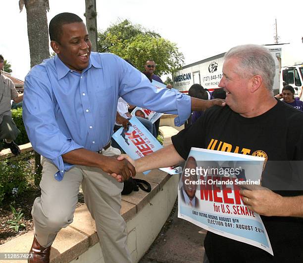 Florida Democratic candidate for the U.S. Senate, Kendrick Meek, greets supporters as he arrives to do some roadside sign-waving in Orlando, Florida,...