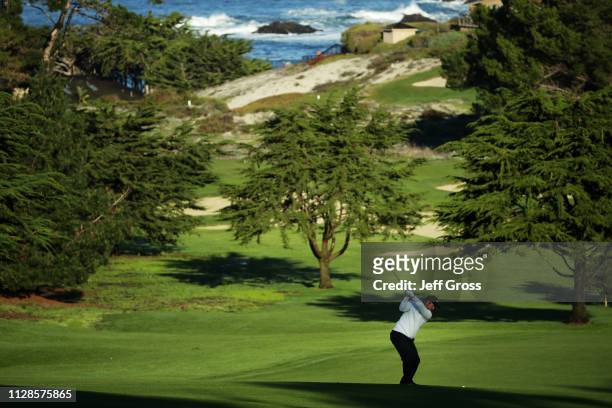 Paul Casey of England plays his second shot on the first hole during the third round of the AT&T Pebble Beach Pro-Am at Spyglass Hill Golf Course on...