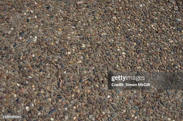 pebble concrete driveway surface (also known as pebblecrete or exposed aggregate) - exposed aggregate stock pictures, royalty-free photos & images