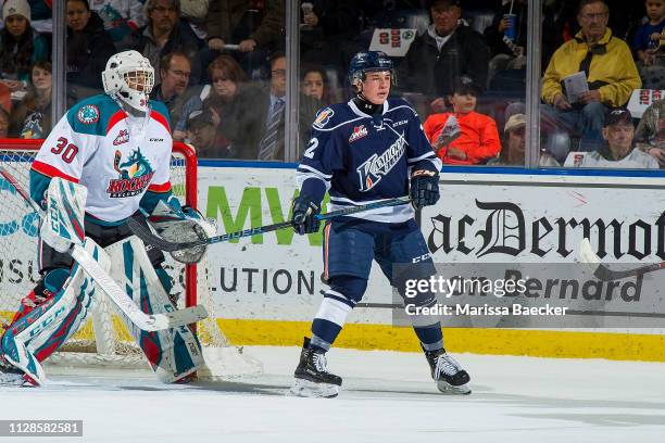 Martin Lang of the Kamloops Blazers looks for the pass ahead of the net of Roman Basran of the Kelowna Rockets at Prospera Place on February 2, 2019...