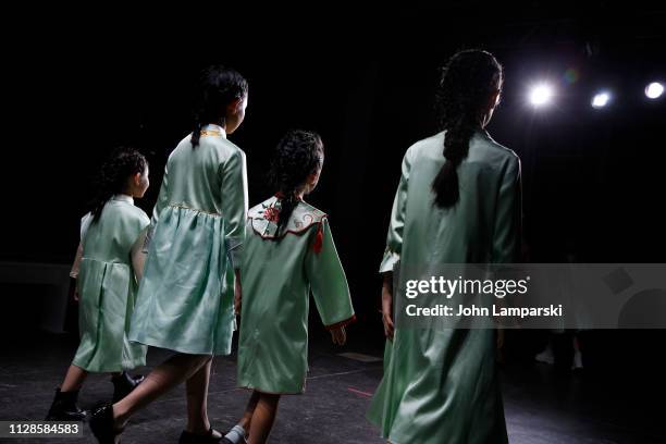 Models prepare backstage for Amelie Wang during New York Fashion Week: The Shows at Industria Studios on February 09, 2019 in New York City.