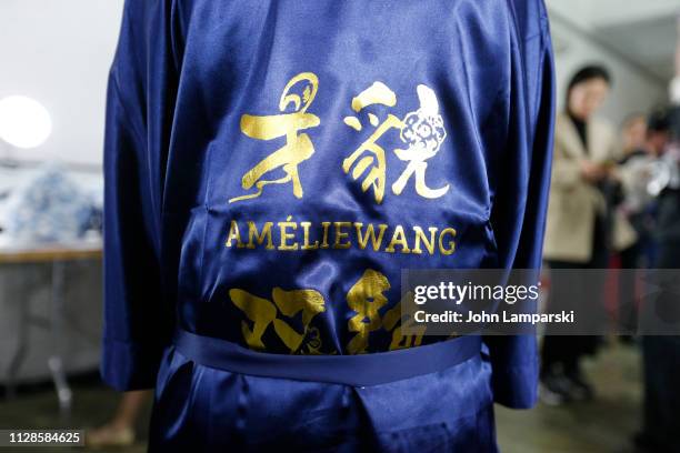 Model prepares backstage for Amelie Wang during New York Fashion Week: The Shows at Industria Studios on February 09, 2019 in New York City.