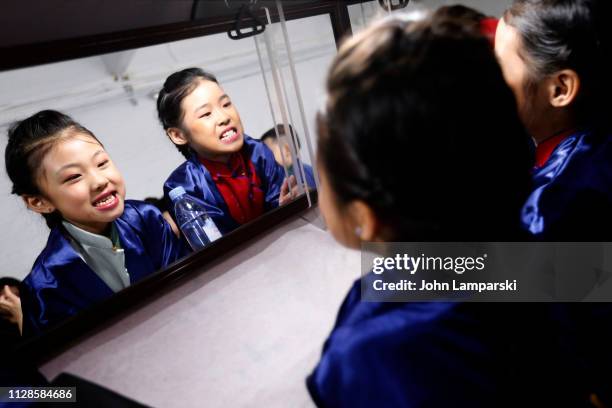 Models prepare backstage for Amelie Wang during New York Fashion Week: The Shows at Industria Studios on February 09, 2019 in New York City.