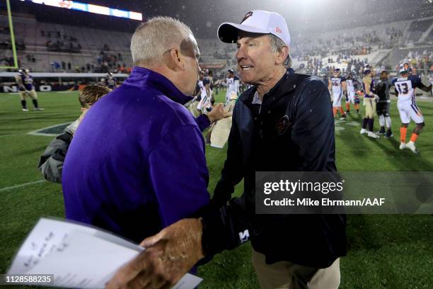 Head coach Kevin Coyle of Atlanta Legends and head coach Steve Spurrier of Orlando Apollos meet on the field following the game on February 09, 2019...