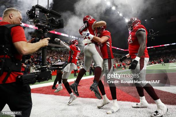 Kenneth Farrow II of the San Antonio Commanders celebrates with teammates after scoring a touchdown during the fourth quarter against the San Diego...