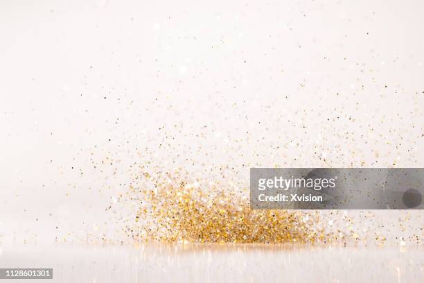glittering golden and silver colorful shinny decoration background - celebration gold stock pictures, royalty-free photos & images