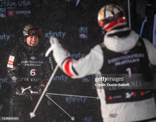 Bradley Wilson of the United States looks at Mikael Kingsbury of Canada after the final in the Men's Dual Moguls Final of the FIS Freestyle Ski World...