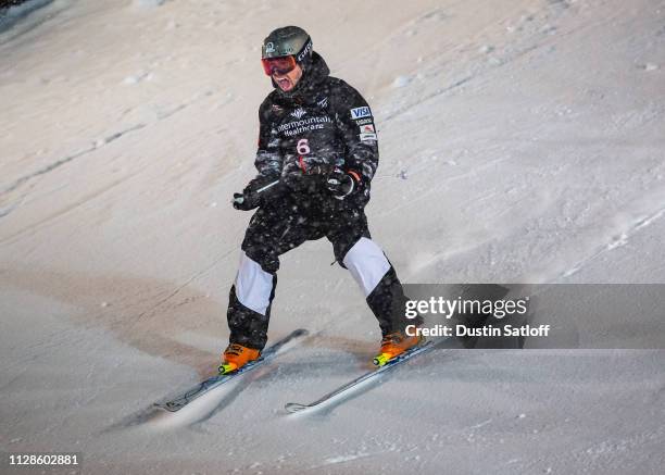 Bradley Wilson of the United States reacts after crossing the finish line during the final on his way to finishing in second place in the Men's Dual...