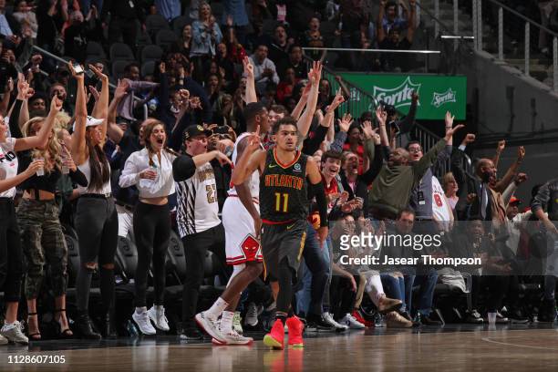 Trae Young of the Atlanta Hawks celebrates a shot during the game against the Chicago Bulls on March 1, 2019 at State Farm Arena in Atlanta, Georgia....