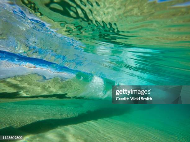 under the wave - gold coast wave stock pictures, royalty-free photos & images