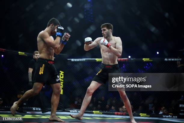 Anatolii Zhurakivskyi and Arman Esayan seen in action during the WWFC 14 Match in Kiev, Ukraine.