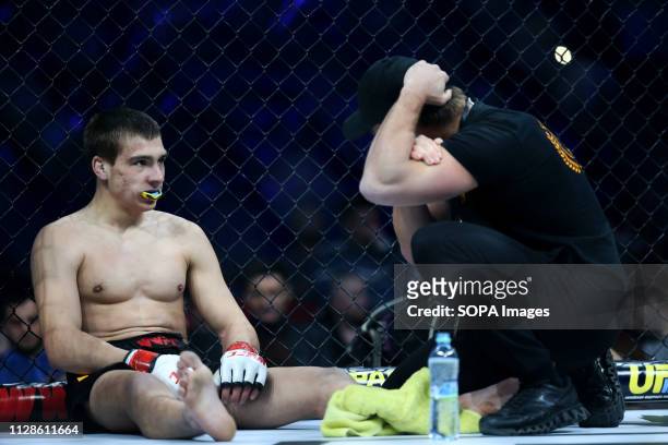 Mikhail Shabliy seen resting in the middle round during the WWFC 14 Match in Kiev, Ukraine.
