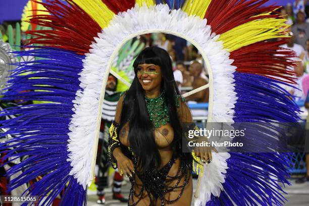 Revelers of Samba School Imperatriz Leopoldinense perform during the parade at 2019 Brazilian Carnival at Sapucai Sambadrome on March 4, 2019 in Rio...