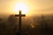 Christ Jesus  cross in the sunrise colored sky background, Worship,  Religious concept., Eucharist Therapy Bless God Helping Repent Catholic Easter Lent Mind Pray.