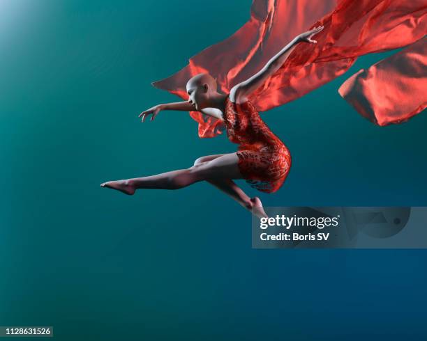 caucasian woman leaping in mid aire with red scarf - ballet dancers russia bildbanksfoton och bilder