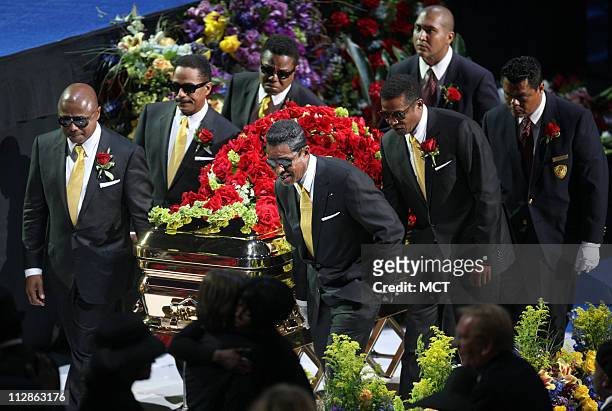 Members of the Jackson family act as pall bearers at the Michael Jackson public memorial service held at Staples Center on July 7, 2009 in Los...