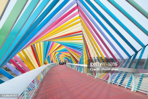 rainbow bridge, qingdao city - bright colour stock pictures, royalty-free photos & images