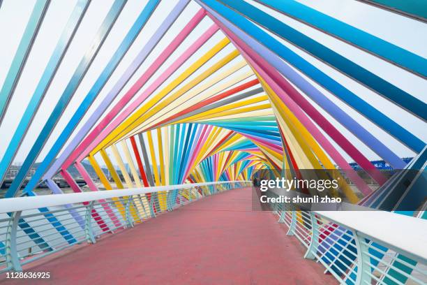 rainbow bridge, qingdao city - qingdao beach stock pictures, royalty-free photos & images