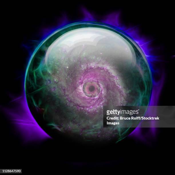 crystal ball with spiral galaxy eye in center. - crystal ball stock-grafiken, -clipart, -cartoons und -symbole