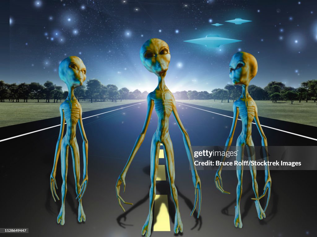 Aliens on country road. Spacecrafts in the starry sky