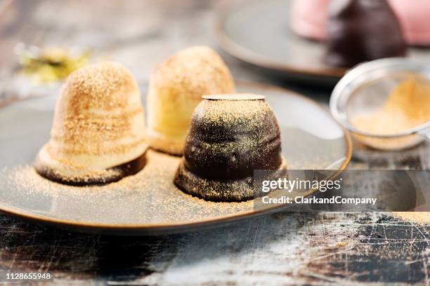 traditional  danish dessert, chocolate flødeboller. - cream cake stock pictures, royalty-free photos & images