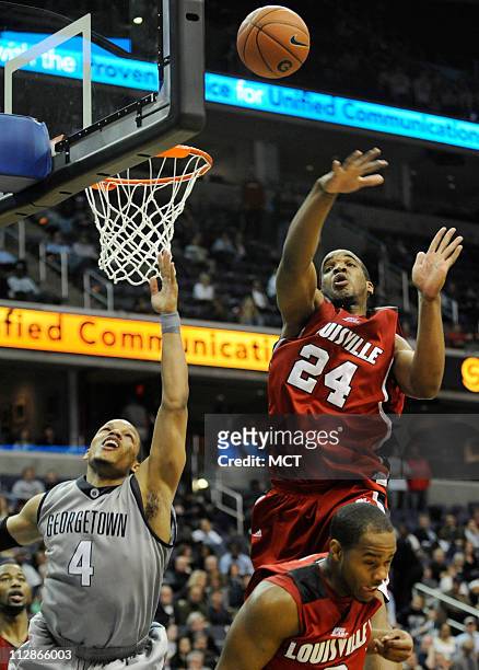 Georgetown guard Chris Wright attempts to score past Louisville forward Samardo Samuels during second half action at the Verizon Center in...