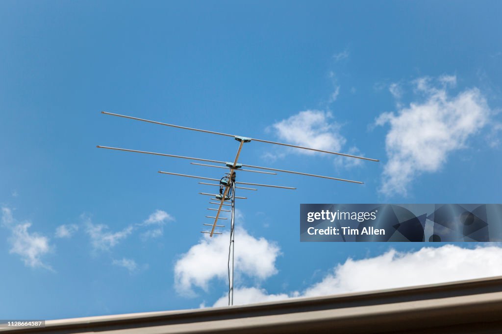 Residential TV Antenna Point Into Beautiful Blue Skies