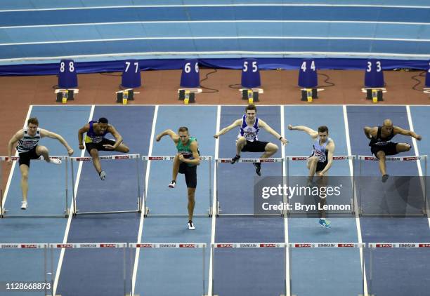 David King of Plymouth on their way to winning the Men's 60m Hurdles Heat 1 during Day Two of the SPAR British Athletics Indoor Championships at...