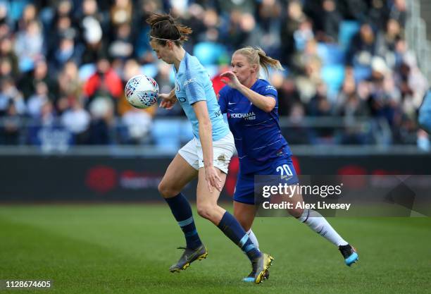 Jill Scott of Manchester City Women shields the ball from Jonna Andersson of Chelsea Women during the FA WSL match between Manchester City Women and...