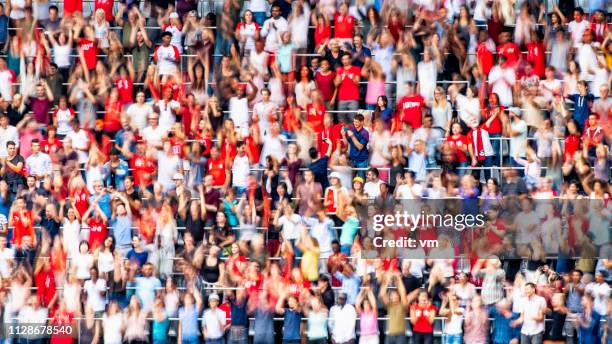 defocused crowds on a sports event - soccer background stock pictures, royalty-free photos & images