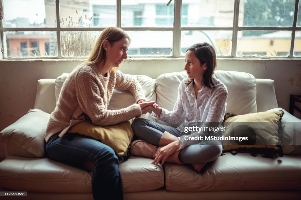Mother and daughter having a talk.