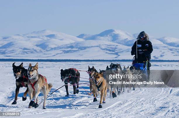 Lance Mackey arrives at the Unalakleet checkpoint in Alaska during the Iditarod on Sunday, March 15, 2009.