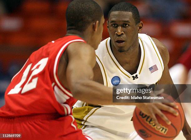 Missouri's J.T. Tiller, right, squares up on Cornell's Louis Dale during game action in the frirst round of the 2009 NCAA Division I Men's Basketball...