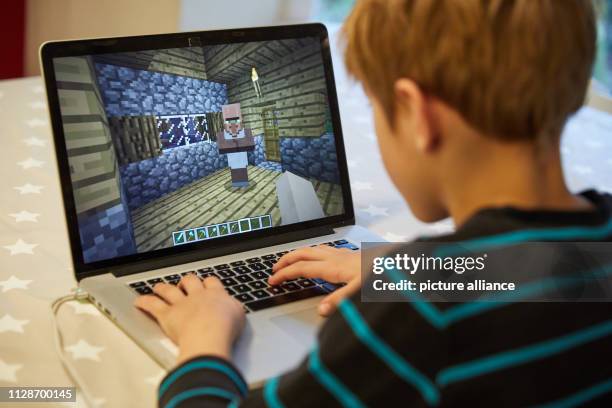 Computer Playing Mc 1,996 Minecraft Video Game Stock Photos, High-Res Pictures, and Images ...