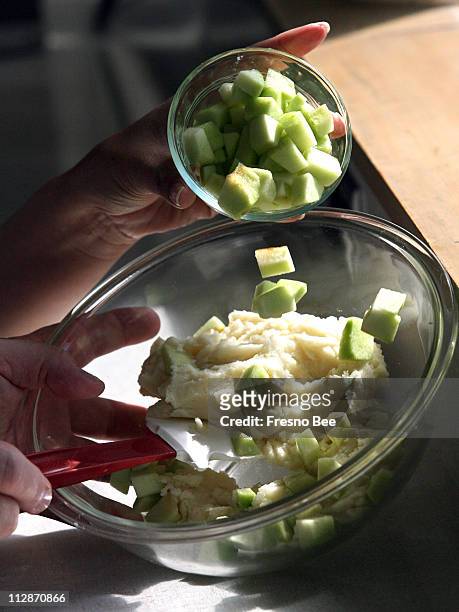 Granny Smith apples are added to mashed potatoes in a German dish "himmel und erde" by Fresno State professor Klaus Tenbergen.
