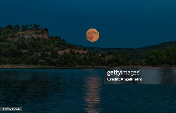 lake with full moon in spanish mountains - majestuoso ストックフォトと画像