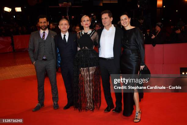 Cas Anvar, Martin Freeman, Diane Kruger, Yuval Adler and his wife Aglika Dotcheva attend the "The Operative" premiere during the 69th Berlinale...