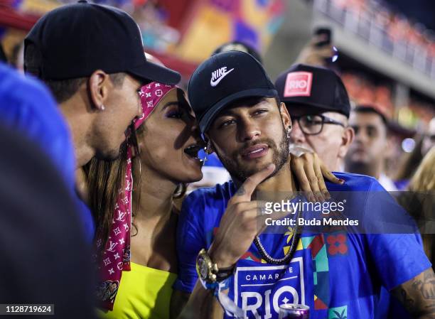 Brazilian football player Neymar attends the parade of the Paraiso do Tuiuti samba school performance during the parade at 2019 Brazilian Carnival at...