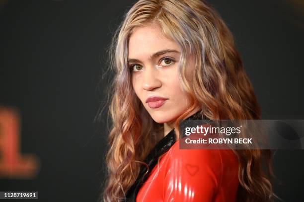 Canadian singer-songwriter Grimes attends the world premiere of "Captain Marvel" in Hollywood, California, on March 4, 2019.