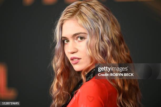 Canadian singer-songwriter Grimes attends the world premiere of "Captain Marvel" in Hollywood, California, on March 4, 2019.