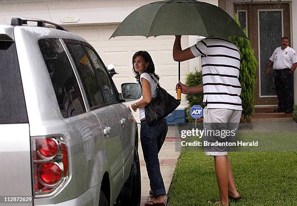 Keith Stansell arrives at his parents' home with his fianc+¼, Patricia Medina , and son, Kyle, in Bradenton, Florida, Saturday, July 12, 2008.