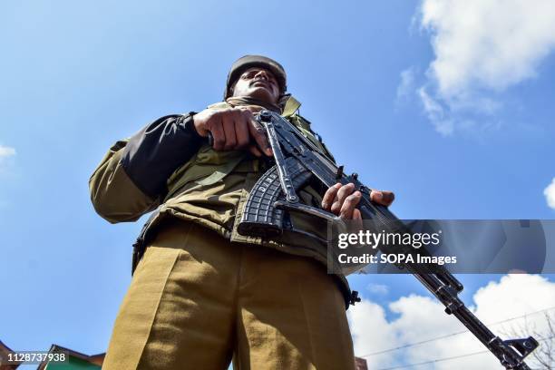 Paramilitary trooper stands alert during shutdown in Srinagar, Kashmir. A complete shutdown is being observed in Kashmir valley to protest against...