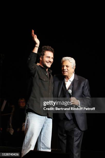 Amir and Enrico Macias perform for Enrico Macias 80th Anniversary at L'Olympia on February 10, 2019 in Paris, France.