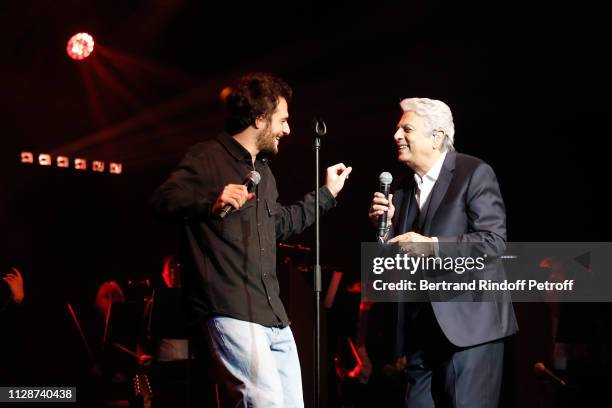 Amir and Enrico Macias perform for Enrico Macias 80th Anniversary at L'Olympia on February 10, 2019 in Paris, France.