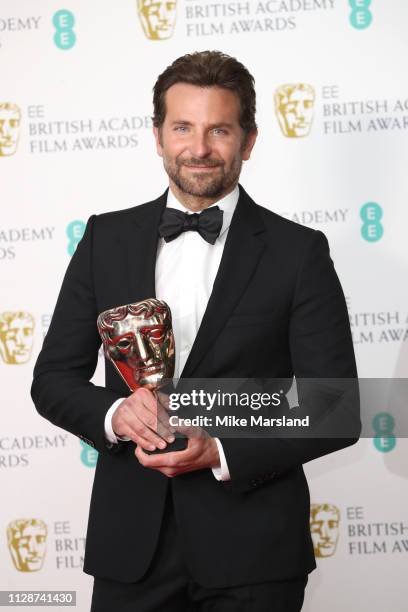 Winner of the Original Music award for A Star Is Born, Bradley Cooper poses in the press room during the EE British Academy Film Awards at Royal...
