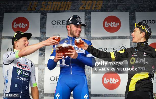 French rider Florian Senechal of Deceuninck - Quick-Step celebrates his victory past second-placed Belgian rider Aime De Gendt of Wanty-Gobert...